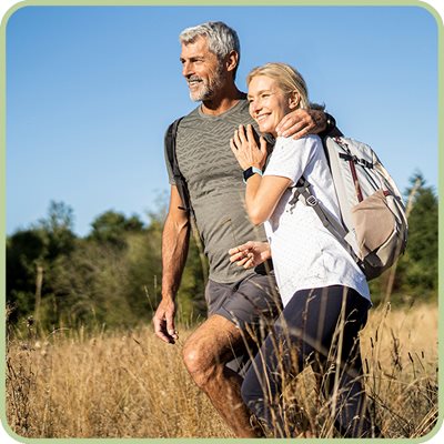 Man and Woman Walking Image