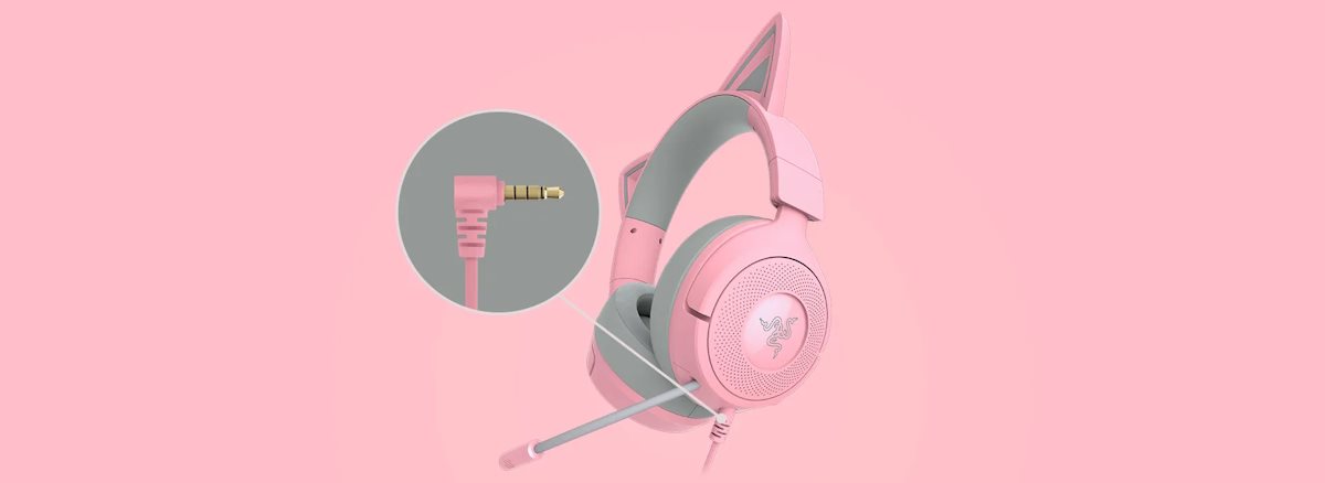 Pink gaming headset with Razer logo, featuring a mic and a close-up of a 3.5mm audio jack plug.