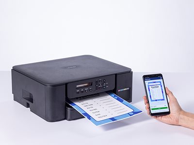 Brother DCP-T580DW being operated wirelessly from a smartphone