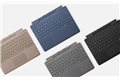 slide 1 of 3, zoom in, microsoft surface pro signature keyboard in staggered position showing colors available