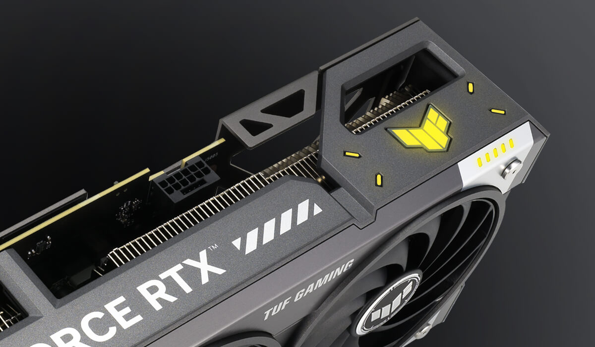 Angled closeup of the ASUS TUF Gaming GeForce RTX 5070 graphics card, highlighting the ARGB elemen