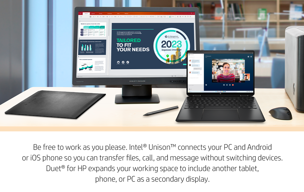 HP 14-inch laptop in an office space with pen, sleeve, mouse, and external monitor.