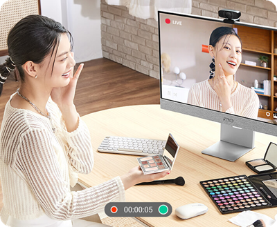 An online course instructor livestreams her course across multiple platforms with the ASUS ZenScreen Smart Monitor MS32UC.