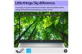 slide 5 of 10, zoom in, hp laptop shows an image of trees