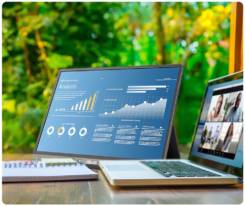 A business man carry the ZenScreen MB16FC portable monitor walking around