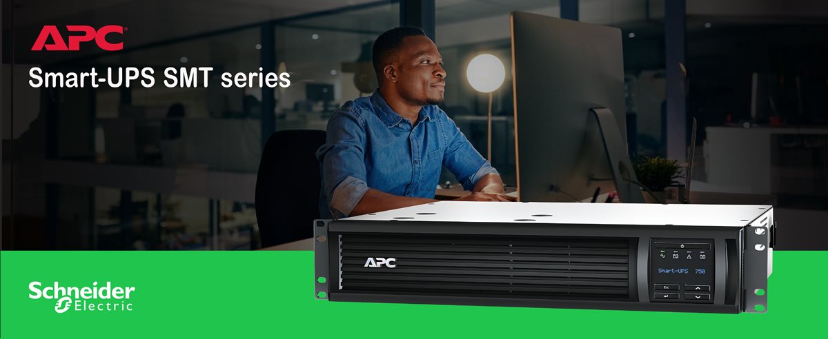 Man working in office with APC Smart-UPS SMT750RM2UC