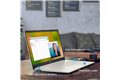 slide 3 of 7, zoom in, hp 15 laptop on a wood table in a living room