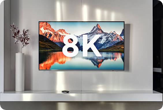 Wall-mounted TV displaying 8K over a scenic mountain and lake image