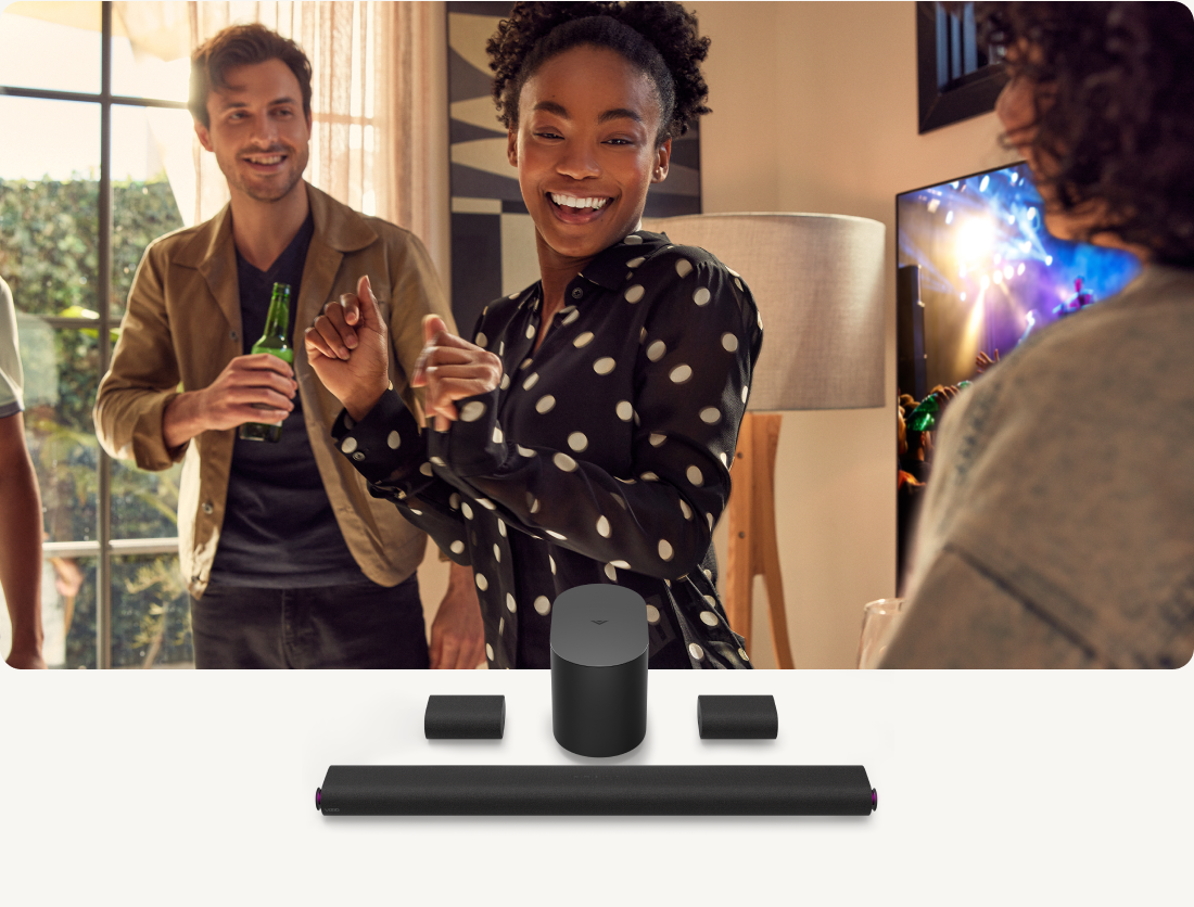 people dancing and VIZIO sound bar
