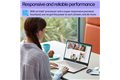 slide 3 of 11, zoom in, young woman browses social media on 14-inch laptop