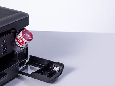 Brother DCP-T780DW hands free tank filling from a magenta ink bottle