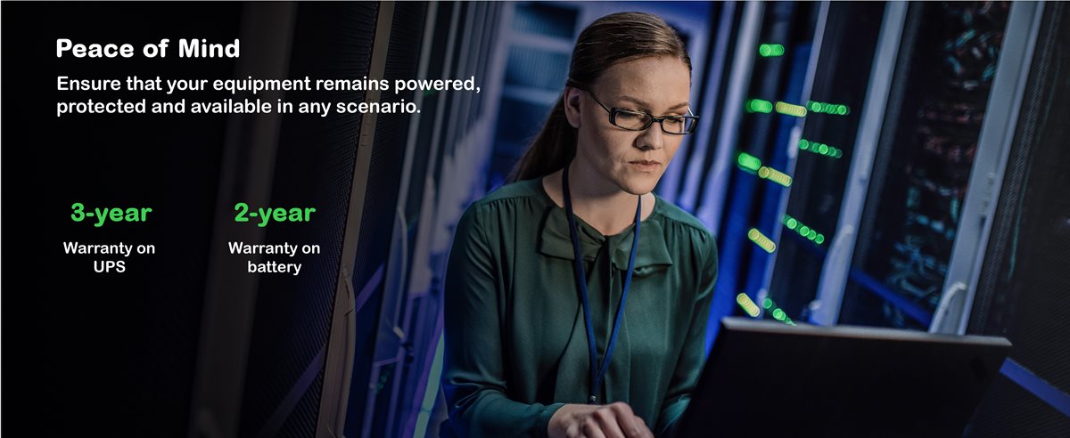 Women working in IT network room with a laptop
