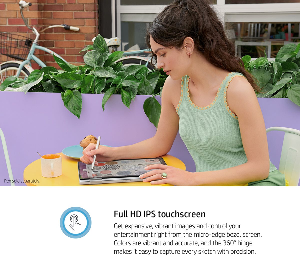 Young creator sketches on the computer in tablet mode with an HP pen.