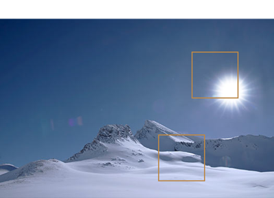 With the PQ Basic setting applied, the sun and snow in the image appears less bright