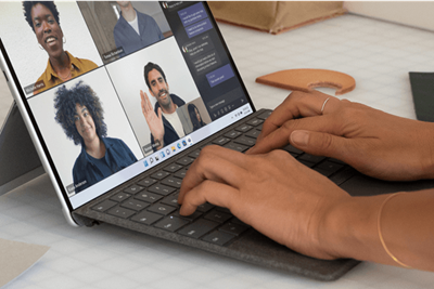 Typing on the Surface Pro Signature Keyboard while on a Microsoft Teams call.