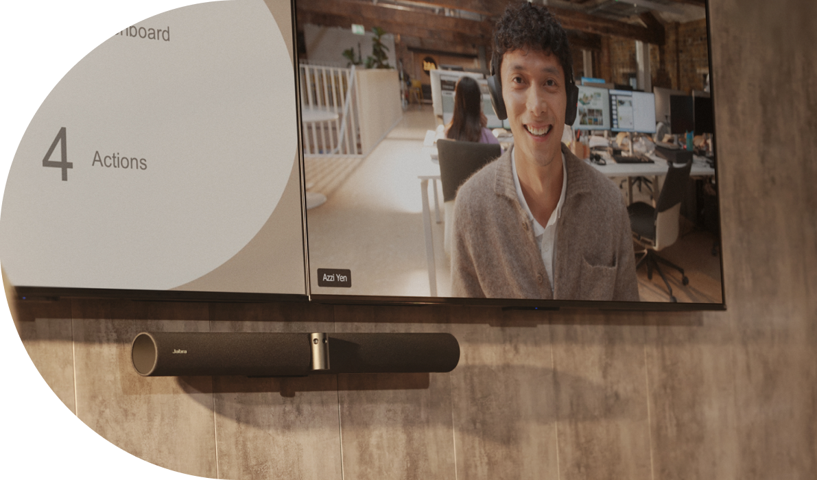 Close‑up of wall‑mounted video bar and screen