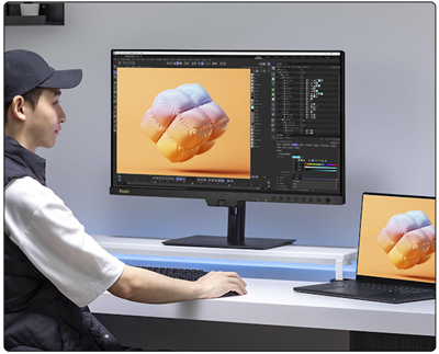 A creator doing gaming project on the ProArt Display