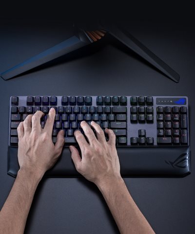 A picture showing a pair of hands using the ROG Strix Scope NX Wireless Deluxe with the lower part of the hands resting on the wrist rest