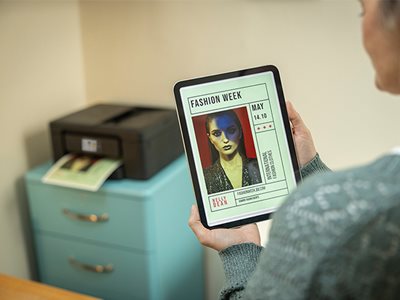 A woman printing from the Brother Mobile Connect app