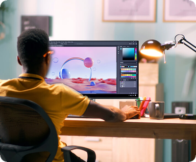 A creator doing photo editing on the ProArt Display