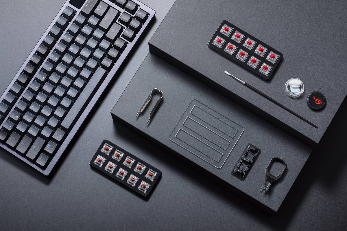ROG Azoth on desk with extra switches and DIY tools