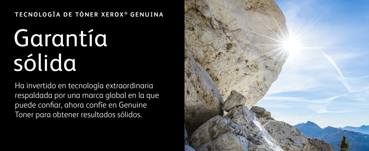 Stack of very large boulders with a climber looking very small by comparison