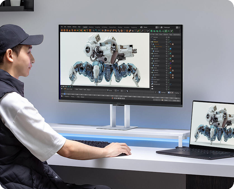 A creator doing gaming project on the ProArt Display