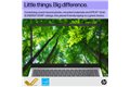 slide 8 of 10, zoom in, hp laptop with an image of trees