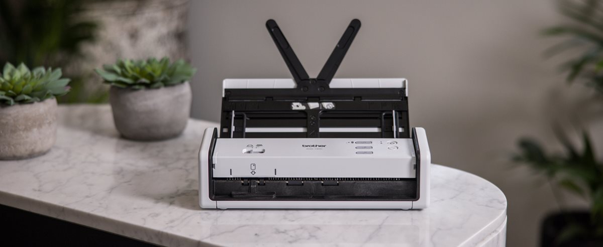 Brother ADS-1300 on a marble surface
