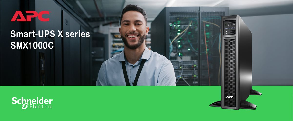 Man in a data center in the background