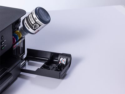 Brother DCP-T580DW hands free tank filling from a black ink bottle