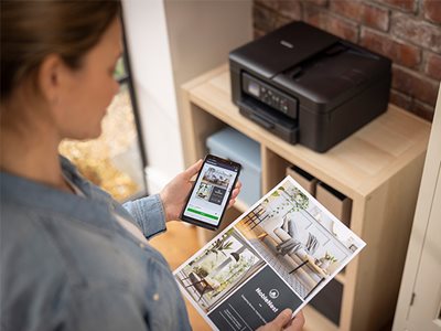 A woman printing from the Brother Mobile Connect app