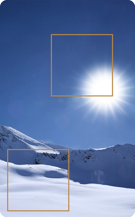 Mit der Einstellung PQ-Optimiert zeigt das Bild die tatsächliche Helligkeit von Sonne und Schnee