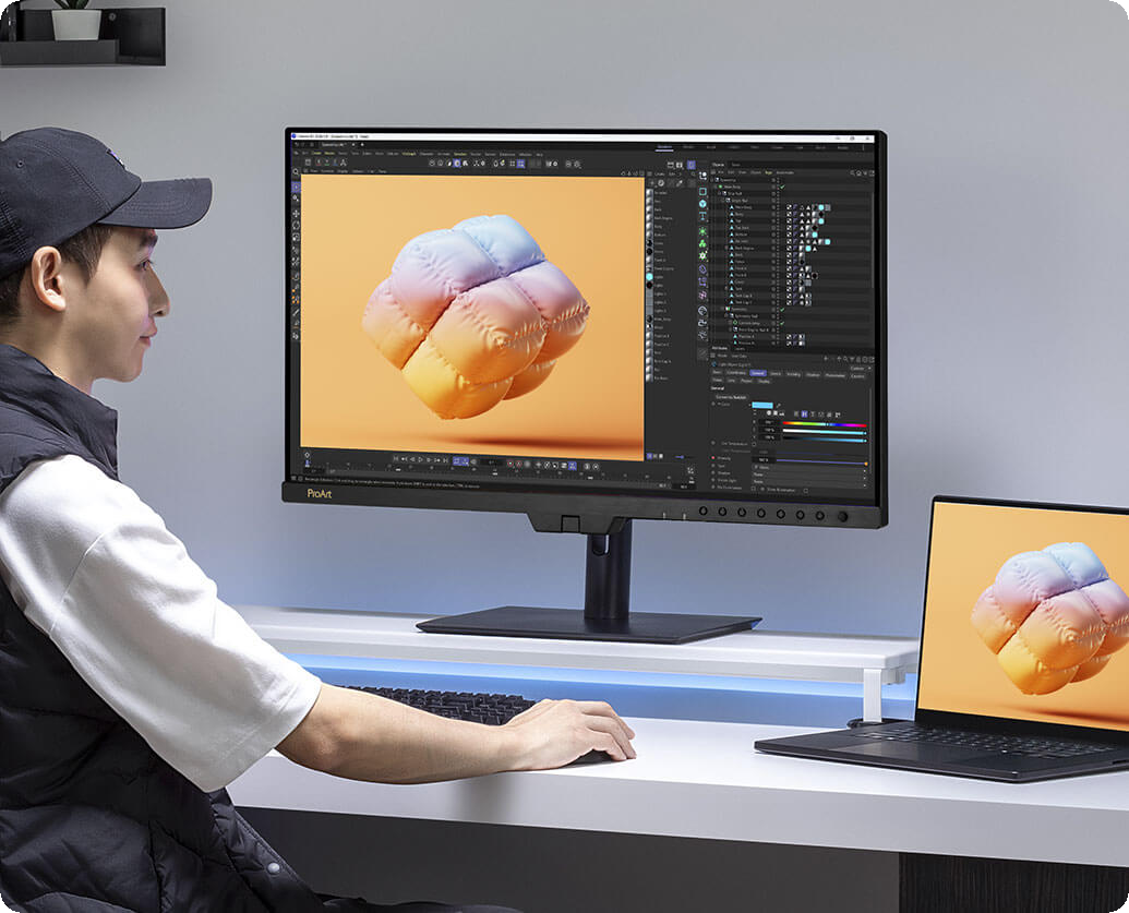 A creator doing gaming project on the ProArt Display