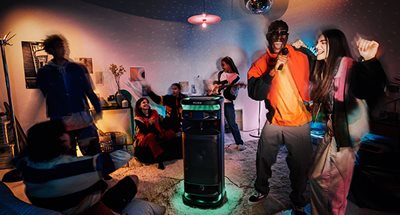 Get your karaoke on with included wireless mic