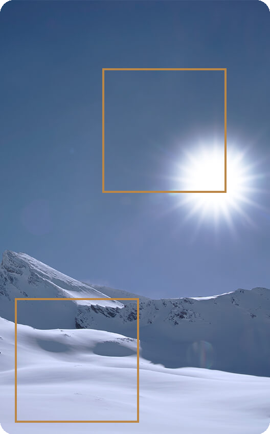 Mit der Einstellung PQ Basic erscheinen die Sonne und der Schnee auf dem Bild weniger hell