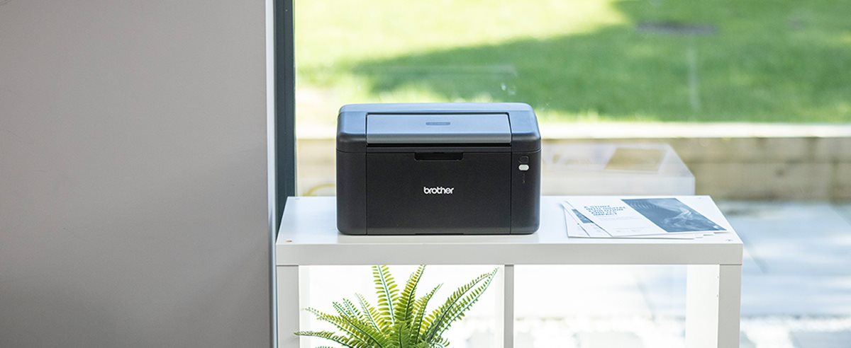 Brother HL-L1240W on a shelving unit in a home environment