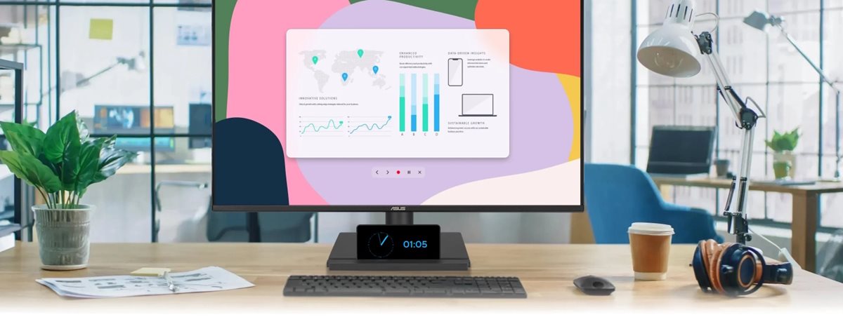 A situational image of a computer screen on the table with some business charts inside