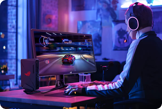A gamer wearing headphones and playing an HDR game