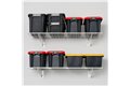 slide 4 of 10, zoom in, saferacks wall mounted garage shelving filled with storage bins.
