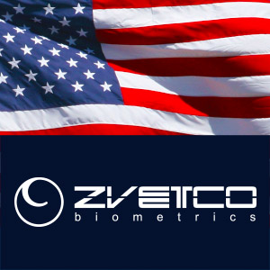 An American flag on top with the Zvetco Biometrics logo on the bottom